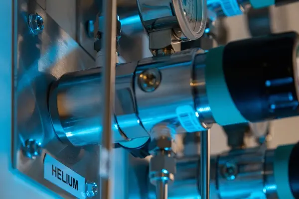 Why did Adam quit his job at the helium factory?