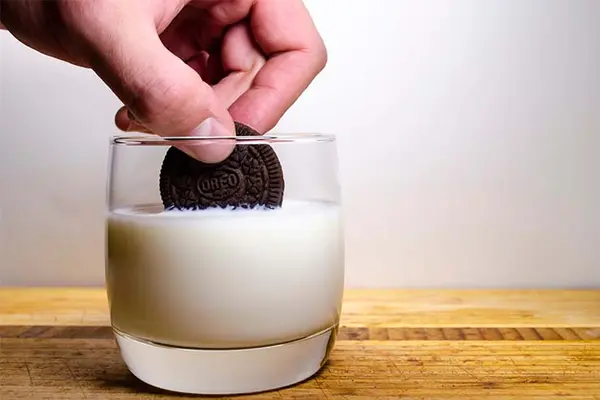 How do basketball players eat Oreo® cookies?