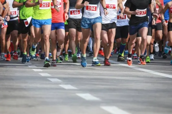 Why did Justin Turner sign up for the marathon near where he grew up?