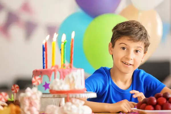 Why did the boy spit out his birthday dessert?
