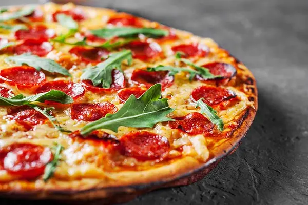 11 Pizza Jokes With Extra Cheese