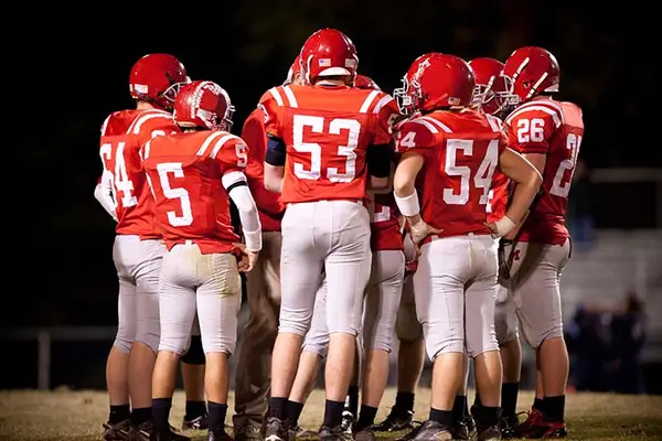 In football math, what is a quarterback worth more than?