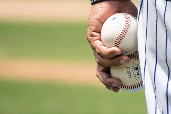 Why is a baseball game a good place to go on a hot day?